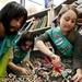 Fourth-grade students and girl scouts Emily Kang and Claire Prochaska work on blankets to send to the New Hope Baptist Church in Newark New Jersey on Tuesday, Jan. 22. Daniel Brenner I AnnArbor.com